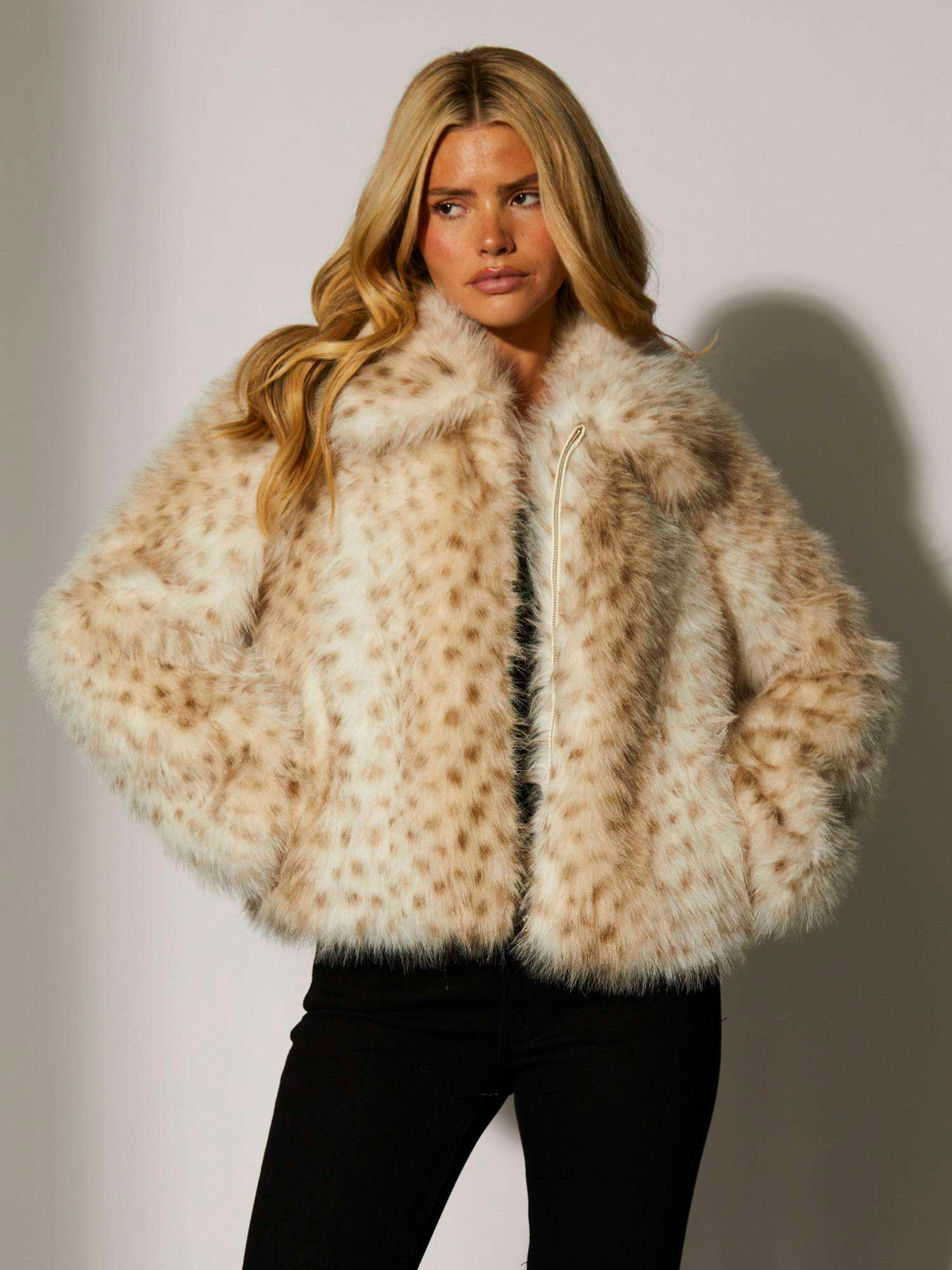 Beige spotted faux fur jacket with collar